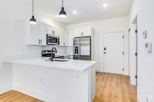 2BR, 2BA - 928SF - Kitchen - The Milk Stacks Apartments