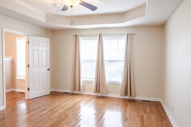 Building Photo - Pet Friendly Three Bedroom with Bonus!