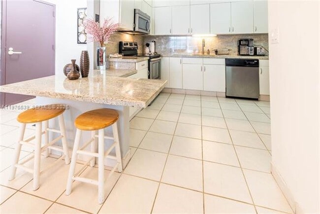 Building Photo - 9341 Collins Ave