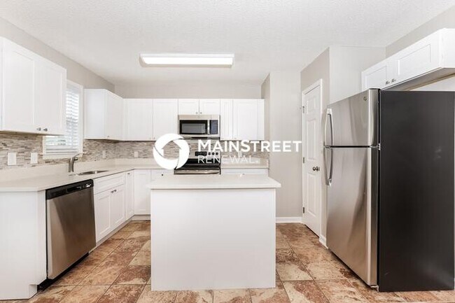 Building Photo - 4 Bedroom Pet-Friendly Home in RALEIGH, NC with Main Street Renewal