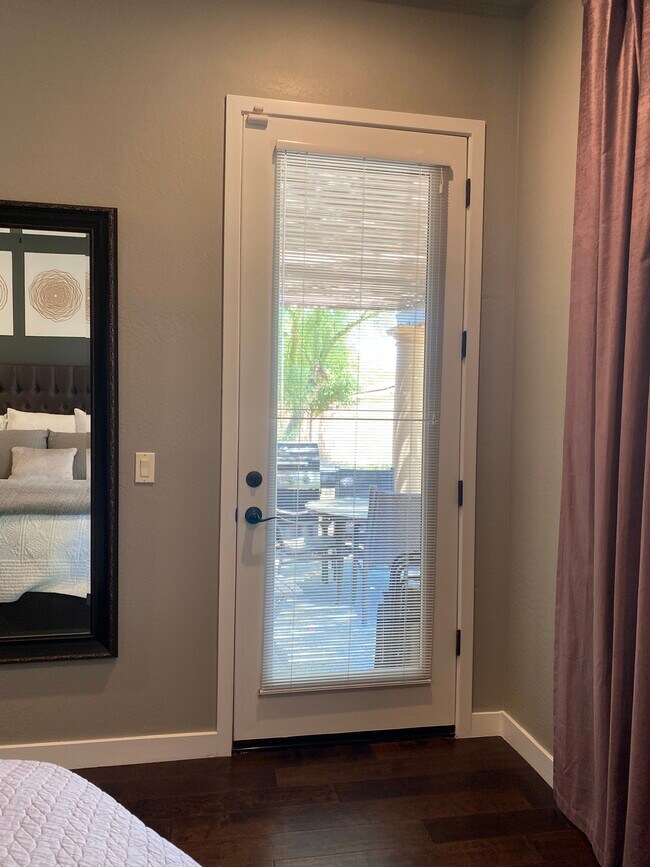 Primary bedroom patio door - 4241 N Pebble Creek Pky