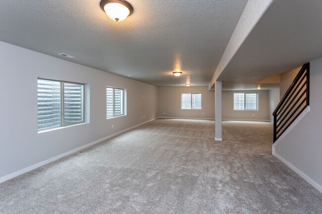 Building Photo - Exceptional 4-Bedroom Home with Dual Fireplaces, Main Level Master Suite, and Spacious Basement -...