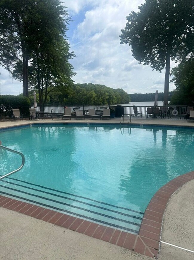 Building Photo - Waterfront Living at Its Finest - Beautifully Remodeled 3BR/2BA, 1st Floor, End Unit Condo on Lak...