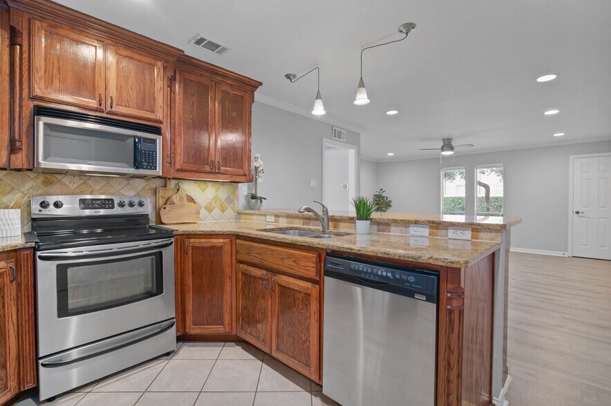 Kitchen Overlooking into Living Room - 5084 Matilda St