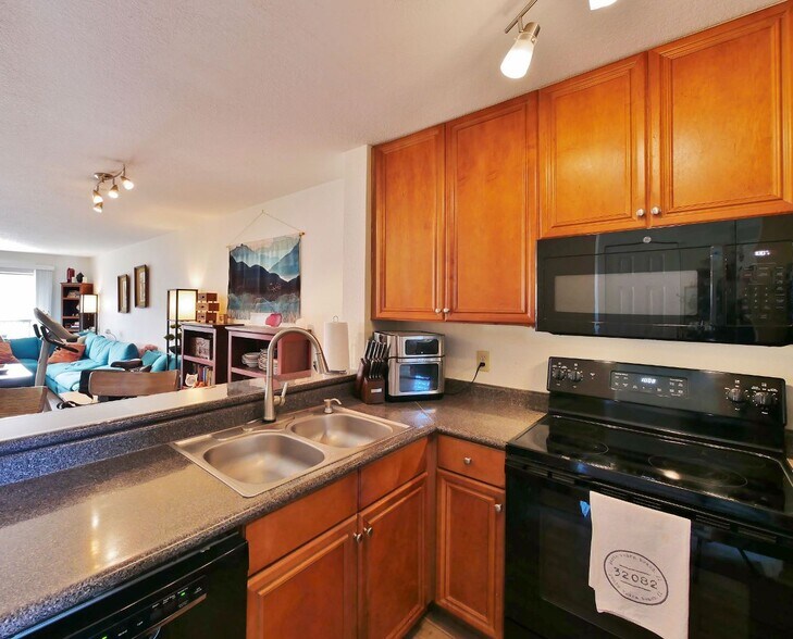 Breakfast Bar Opens Up Kitchen/Living Space - 19 Arbor Club Dr