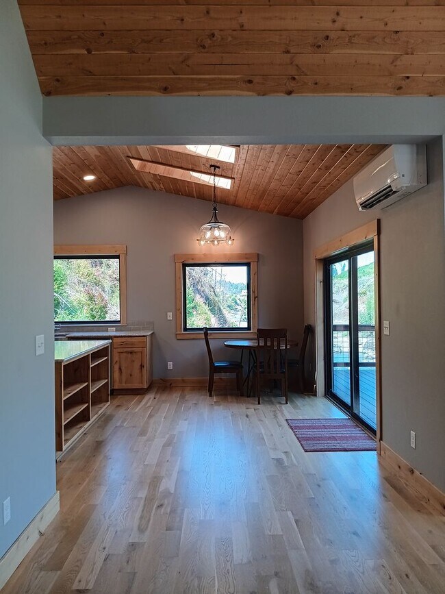 Building Photo - Beautiful Chalet Style Riverfront Property...