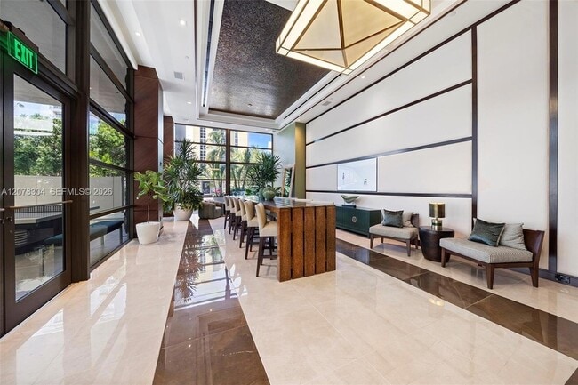Building Photo - 5875 Collins Ave