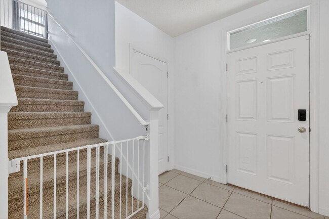 Building Photo - Available Now! 4BR Home in Avalon Park with Fenced Yard & Resort-Style Amenities