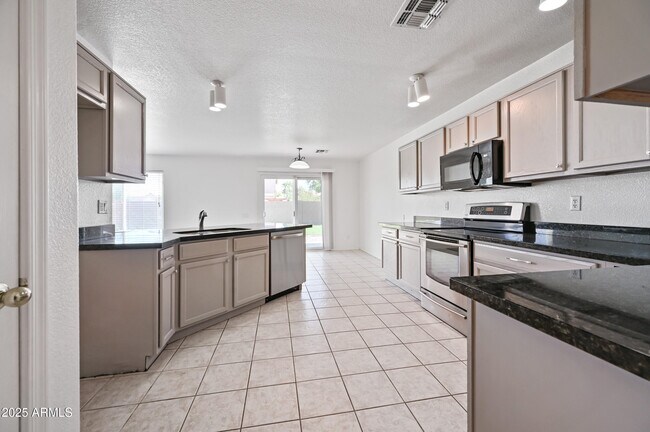 Building Photo - 13011 W Monterey Way