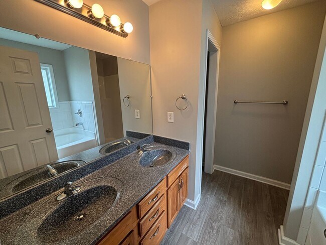 Building Photo - Location, Community, Quality Living. It Starts Here!