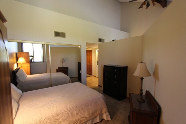 Building Photo - Furnished Country Club Condo | Private Balcony + Golf Course Views