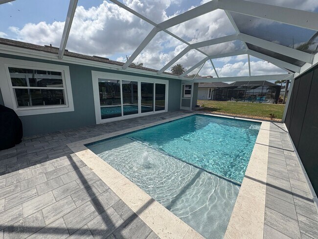 Building Photo - Beautifully Furnished Pool Home with Boat ...