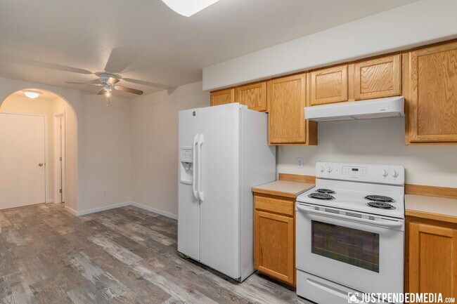 Kitchen and dining room - door to garage - 530 Bitterroot Cir