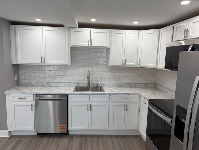 Building Photo - Fully Renovated 3BR/2BA Corner Twin Home-Move in Ready