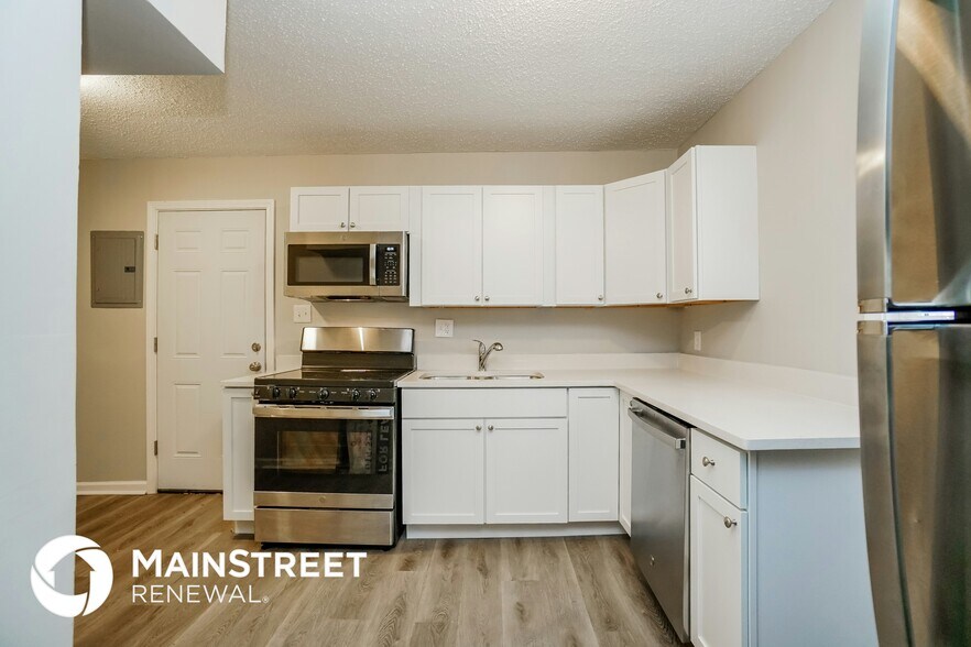 Building Photo - 5103 Dimson Dr N