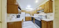 Building Photo - 3D Tour Available! West Side Home + Sunroom + Attached Garage + Pets Welcome + Washer & Dryer!  A...