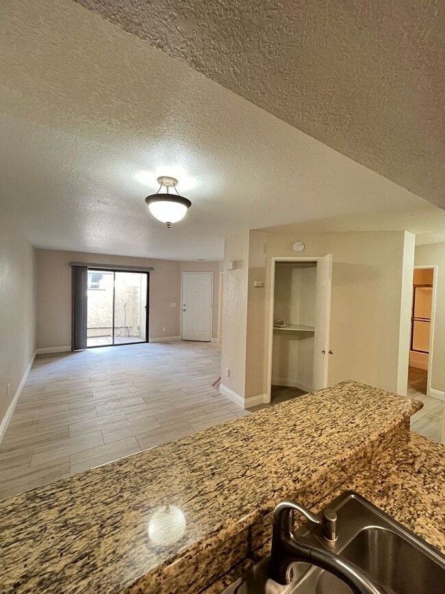 Building Photo - BEAUTIFULLY UPGRADED 1 STORY CONDO