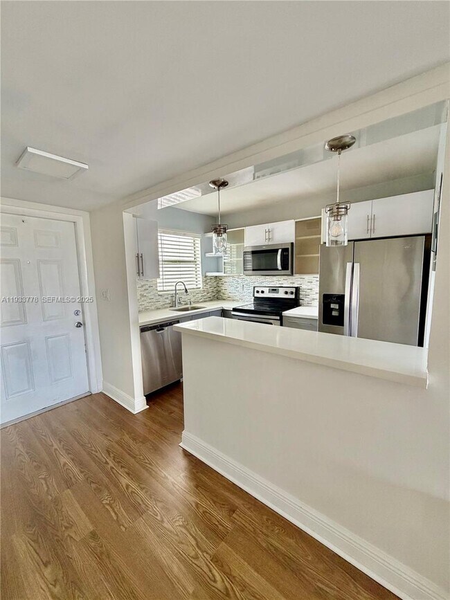 Building Photo - 8350 Sunrise Lakes Blvd