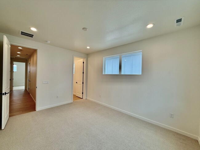 Building Photo - NEW CONSTRUCTION Gorgeous 2 Bedroom in clo...