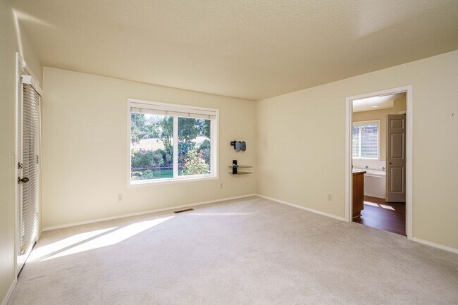 Building Photo - Beautifully Landscaped 1/4 acre with Well Maintained 4 bedroom 2 Bath Home with 3 Car Garage