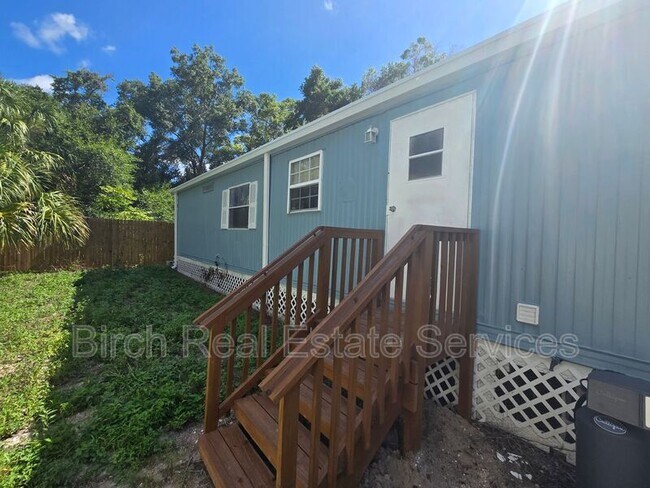 Building Photo - 8628 Adonis Rd