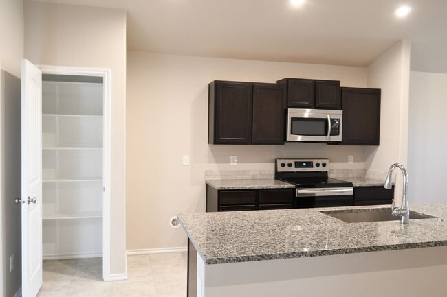 Building Photo - Beautiful Brand New Custom Brick Home 3 bed/ 2 bath/ 2 car garage Open Concept with huge backyard...