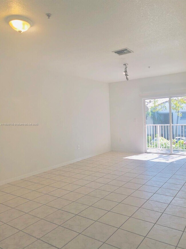 Building Photo - 5670 NW 116th Ave