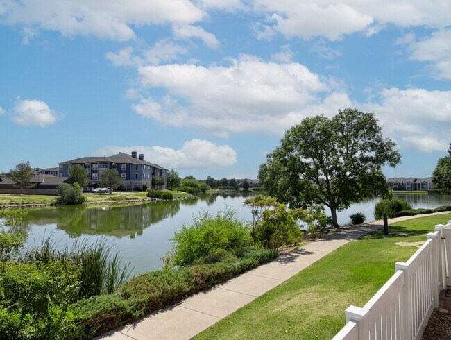 Building Photo - Lakeside 3 Bed/2.5 Bath Townhome in Gateway Community! Quiet, Scenic Living in The Heart Of Denver!