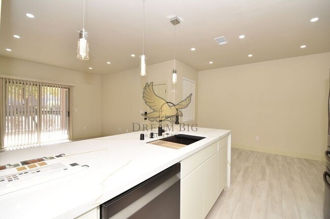 Building Photo - 8000 W Badura Ave