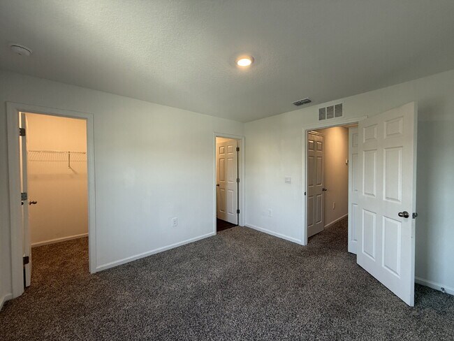Building Photo - "Charming 2-Bedroom Townhouse Retreat with...