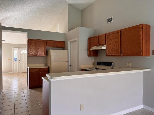 Building Photo - 8013 Gamboge Ct