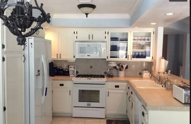 Building Photo - Stunning 2-story home offering 3 bedrooms, 2.5 bathrooms, with Pool