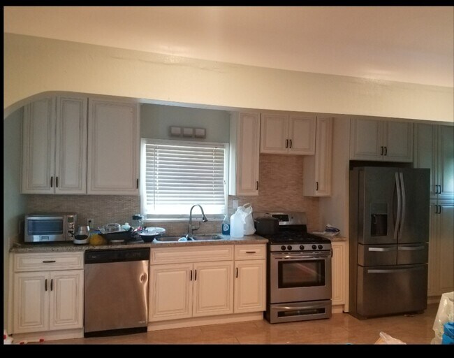 Building Photo - 7823 S Denker Ave