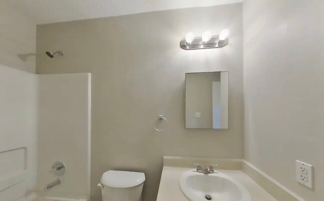 Building Photo - Contemporary 4-Bedroom Gem with Open-Plan Design