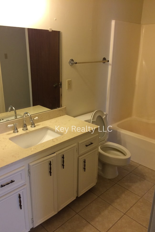 Building Photo - 6016 Quail Ridge