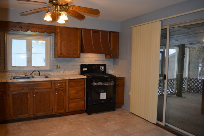 Kitchen with sliders to screened porch - 127 Sheldon Ave