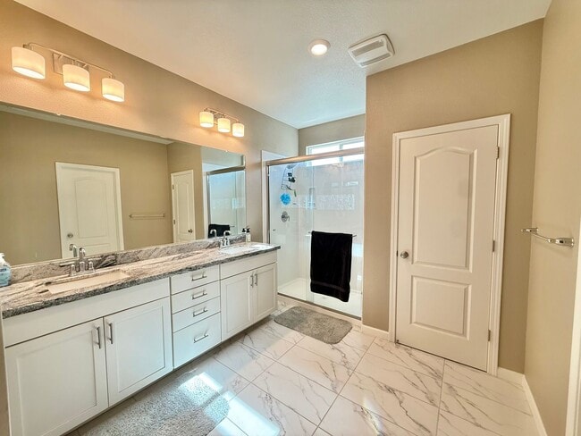 Building Photo - Spacious 5-Bedroom Home | Private Yard + Attached Garage