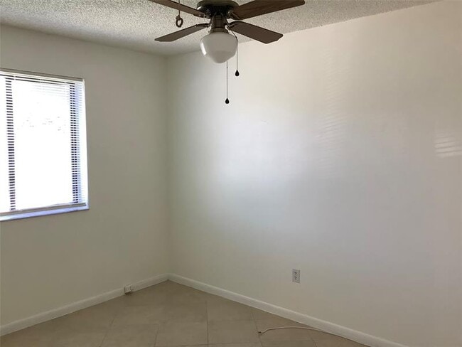 Building Photo - 10128 Boca Bend E