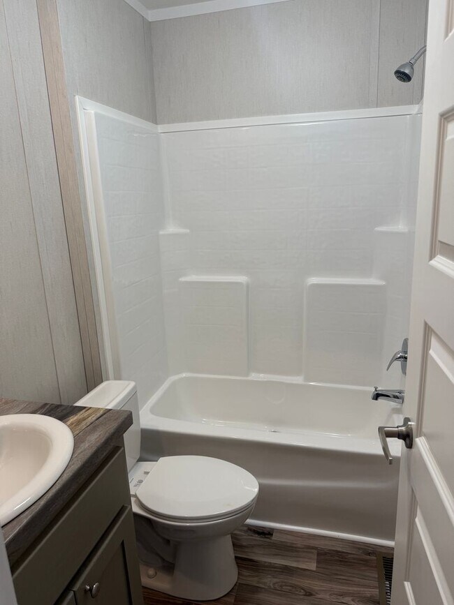 Building Photo - BRAND NEW-3 Bedroom / 2 Bath-MOVE-IN SPECI...