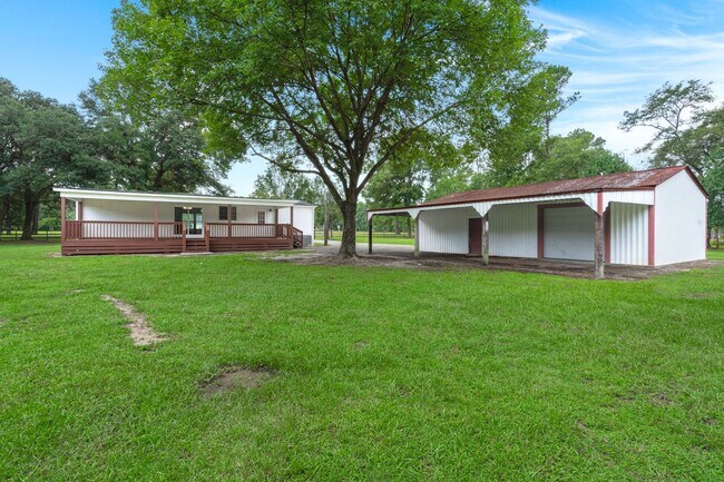 Building Photo - beautifully refreshed 3-bedroom, 2-bath home offering peaceful country living with modern updates!