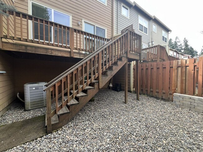 Building Photo - Beautiful 2 Bedroom Townhome with Walk-In Closets Private Deck & Attached Garage