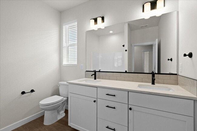 Building Photo - Spacious 4-Bedroom Home with Modern Comforts