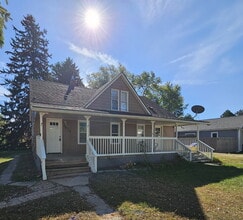 Building Photo - Duplex - 2 Bedroom Completely Remodeled Living Space with New Laminate Flooring on Main Floor alo...