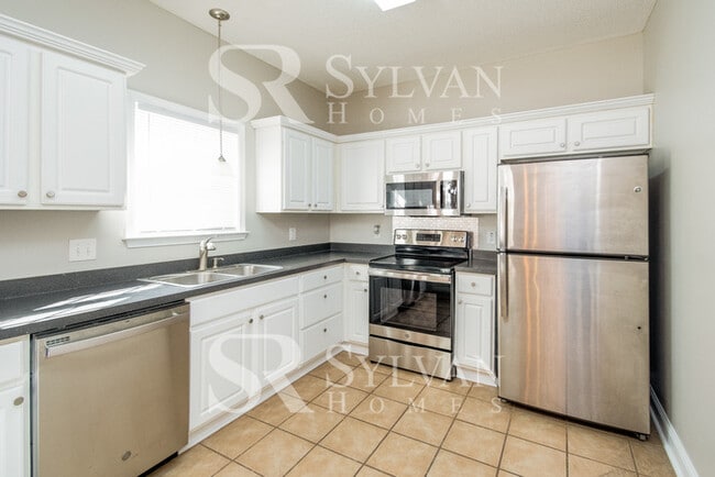 Building Photo - Turn the key. Enter. Smile. Repeat every day!