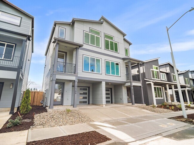 Building Photo - $1,000 off 1st month! Beautiful, brand spanking new 2-bdrm/2.5-bath duplex townhome! W/D, garage,...