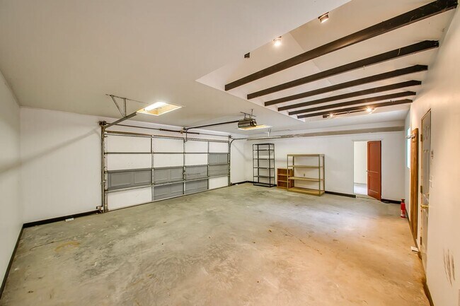Building Photo - Charming 3-Bedroom Home with Spacious Base...