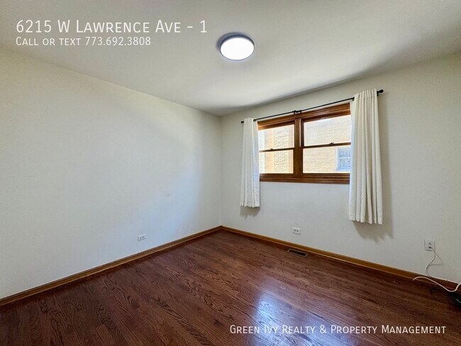 Building Photo - 6215 W Lawrence Ave