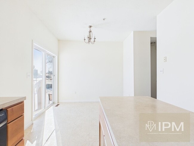 Building Photo - Modern 3 Bedroom Townhome with Garage & Outdoor Amenities!