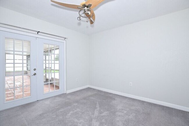 Building Photo - Gorgeous 4/2 Pool Home with a Covered Patio and a Large Fenced Backyard Located in Dr. Phillip's ...