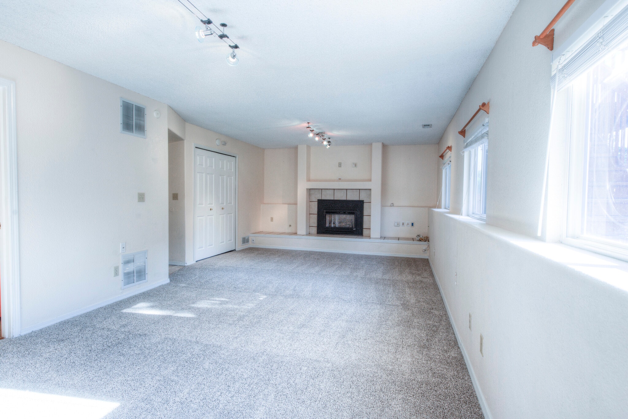 Family room is large and has surround hookups and plenty of light. - 2875 Richmond Dr